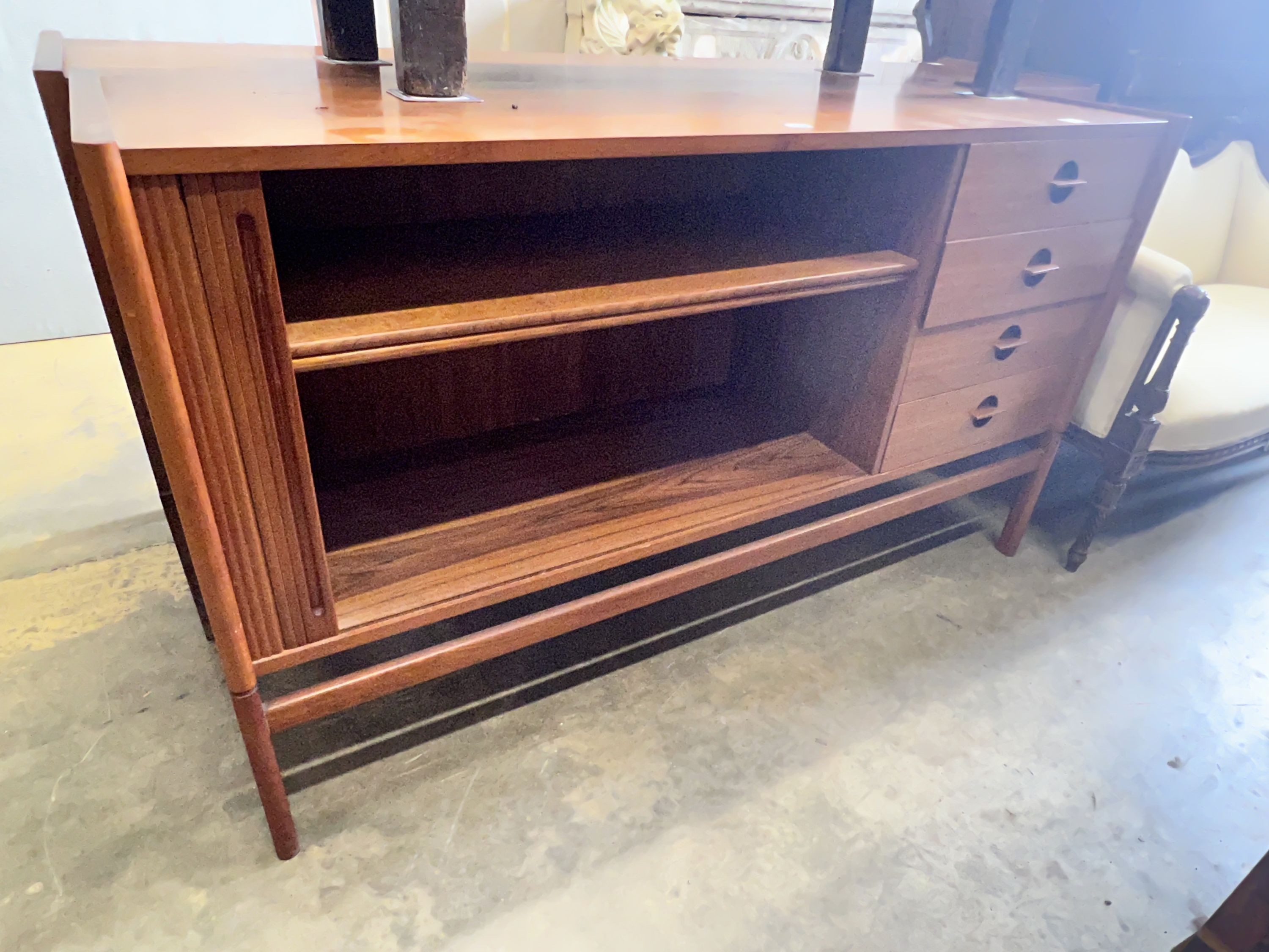 A 1950's Danish teak tambour four drawer sideboard, width 150cm depth 46cm height 86cm
